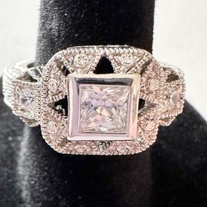 Vintage fashion princess cut sterling silver cubic zirconia. Size 6 3/4.